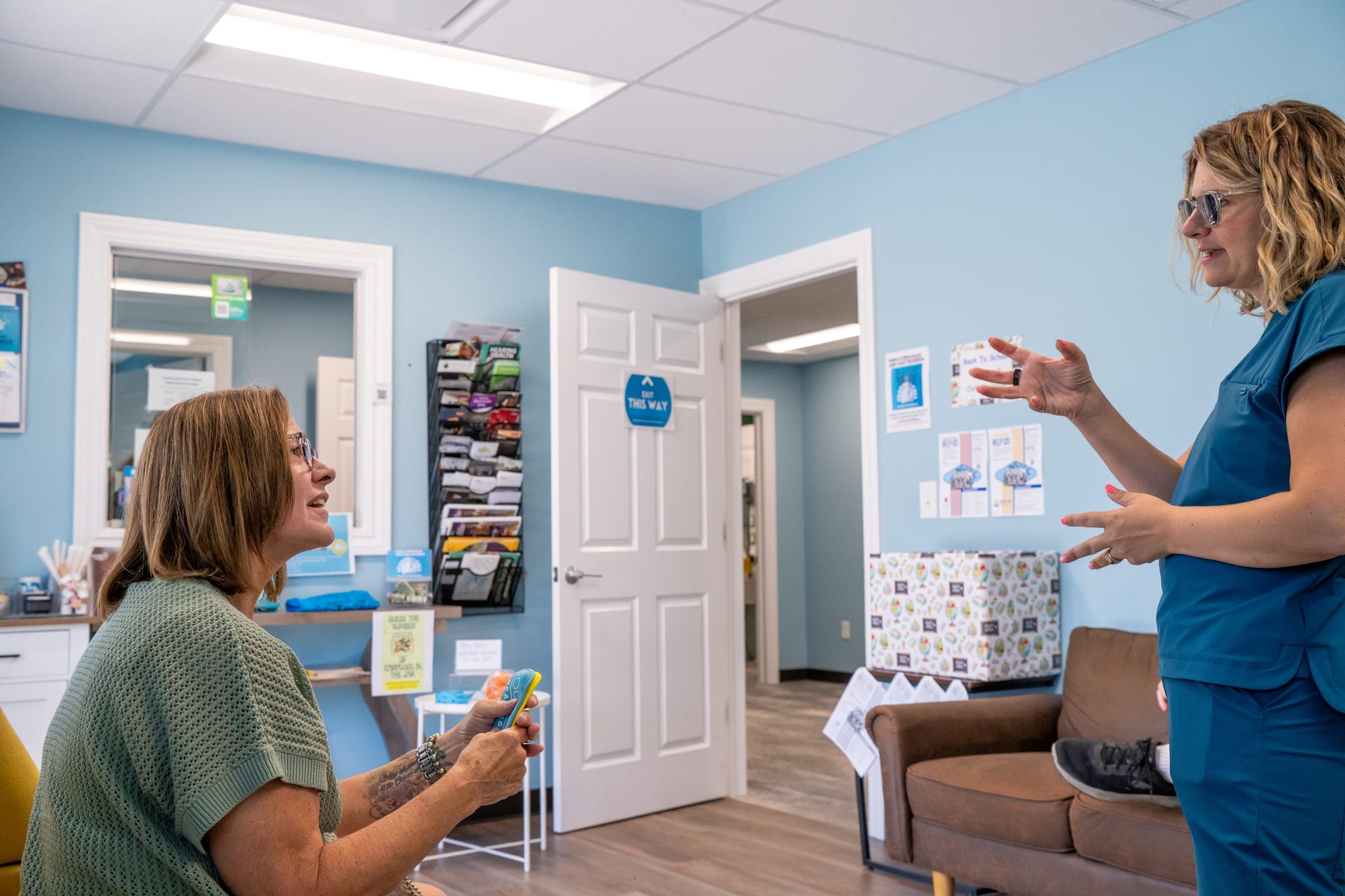 Doctor of Audiology reviewing results with a patient at Sounds of Life Hearing Center